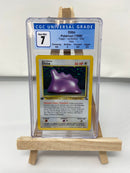 Ditto Fossil Holo 1st Edition CGC 7 3768023010